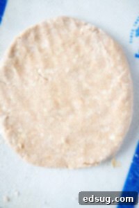 cinnamon scone dough in a round disk