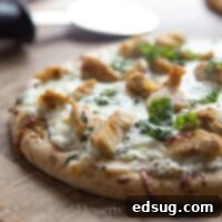 white chicken pizza on a board