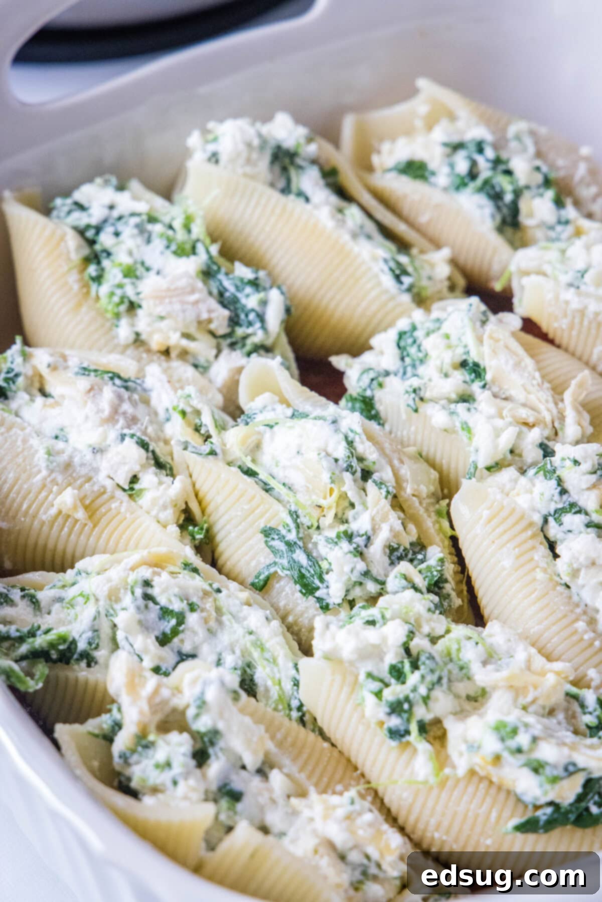 spinach stuffed shells in a baking dish