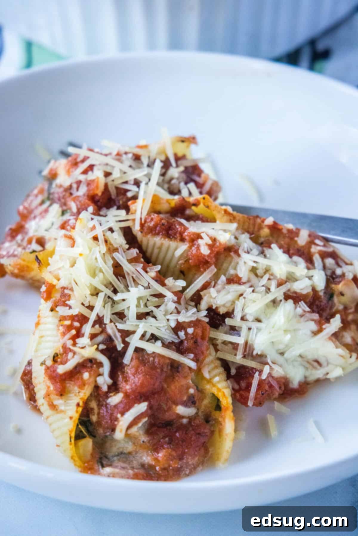 plate with stuffed shells on it