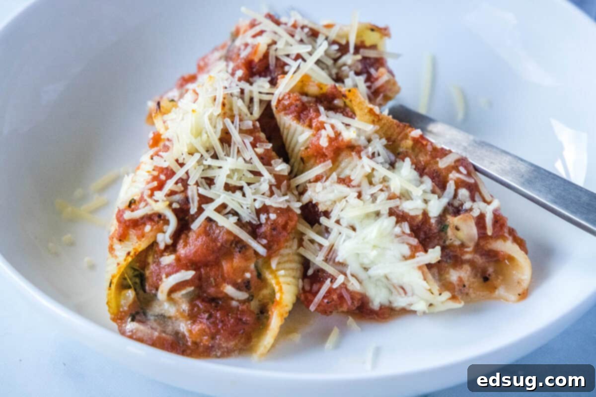 Spinach Stuffed Shells – Jumbo pasta shells are filled with a creamy mix of ricotta, spinach, and artichokes, then baked in a smoky fire-roasted tomato sauce until bubbly.