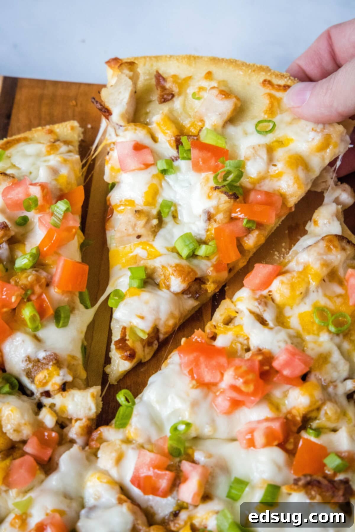 a slice of chicken bacon ranch pizza