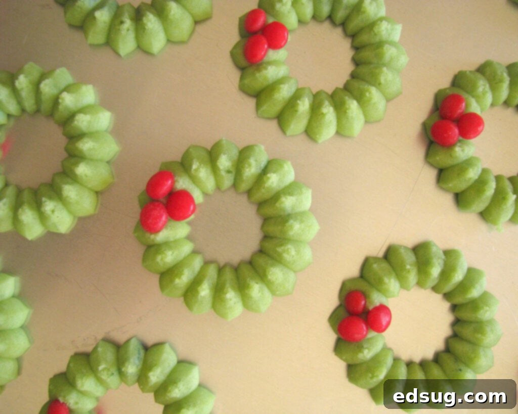 spritz cookies on baking sheet