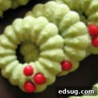 holly wreath spritz cookies on serving tray