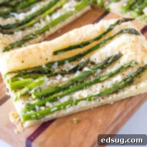 cropped close up sliced asparagus tart