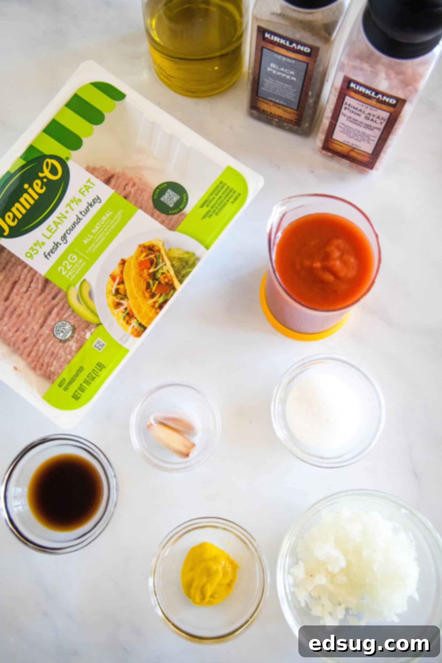 Easy ground turkey Sloppy Joes made with juicy turkey instead of ground beef, cooked in one pan with a rich, flavor-packed homemade sauce! Ingredients for ground turkey sloppy joes laid out on a wooden board.