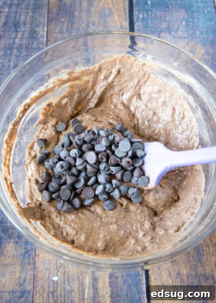 Irresistible Chocolate Pancakes 4 adding chocolate chips to pancake batter