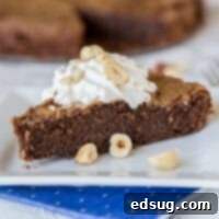 Decadent Chocolate Hazelnut Dream 6 Chocolate Hazelnut Pie - A rich and chocolate pie that is made with lots of Hazelnuts. Naturally gluten free, rich, chocolately, and oh so delicious!