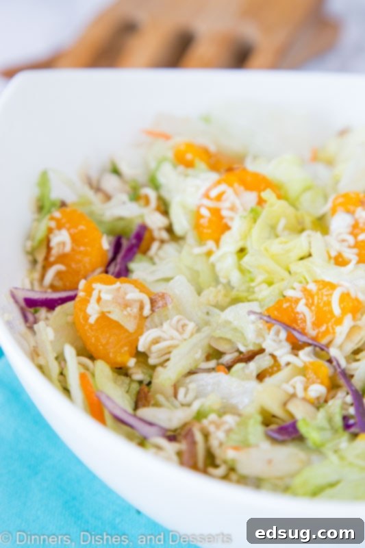 Far East Crunch Salad 3 A plate full of food, with Salad and ramen noodles