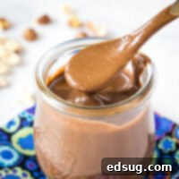 close up of a spoonful of homemade chocolate hazelnut spread