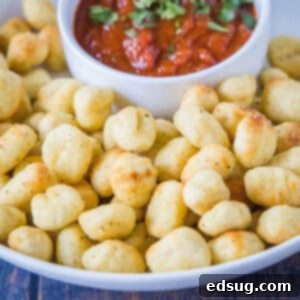 cropped close up air fryer gnocchi on a plate