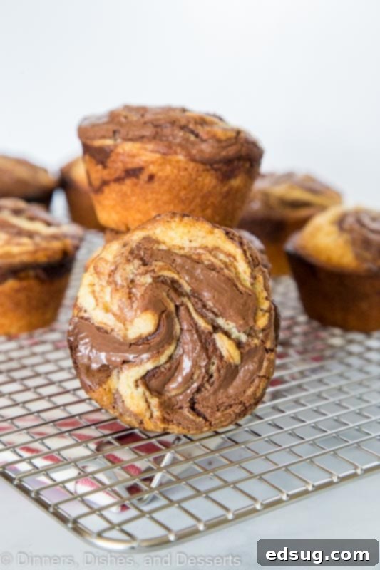 Decadent Nutella Muffins 4 Stacked nutella muffins