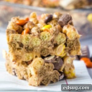 stacked reese's puffs bars cropped close up, a close up of the finished no-bake bars