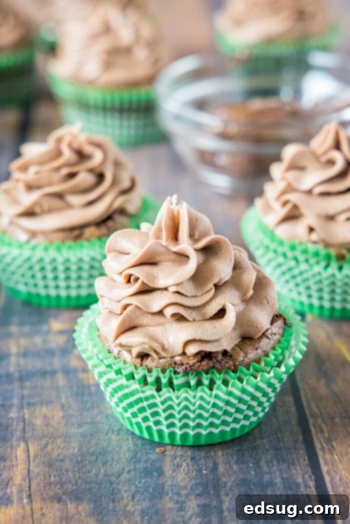 Decadent Nutella Cupcakes 5 Finished chocolate cupcakes beautifully topped with swirl of Nutella frosting