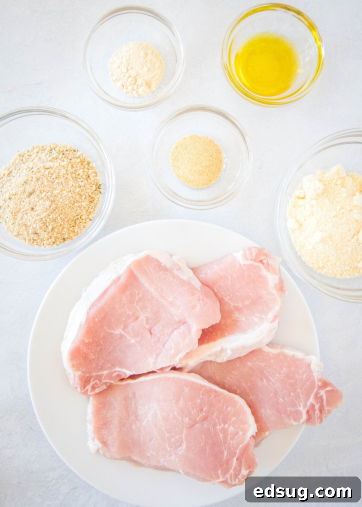 Ingredients for air fryer boneless pork chops laid out before preparation.