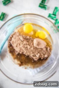 mixing andes mint cookies in a bowl