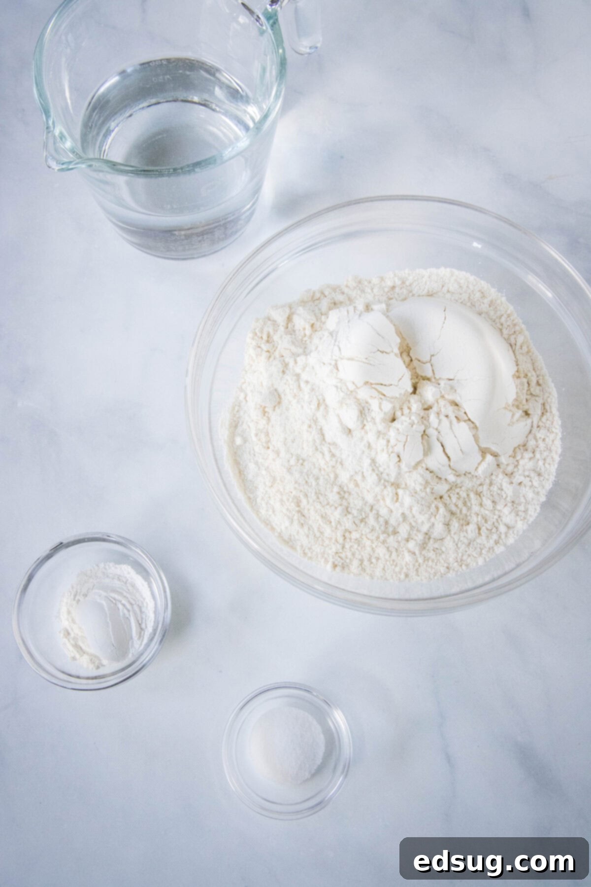 Navajo Fry Bread Tacos 3 Essential ingredients for making Indian fry bread laid out on a wooden surface.