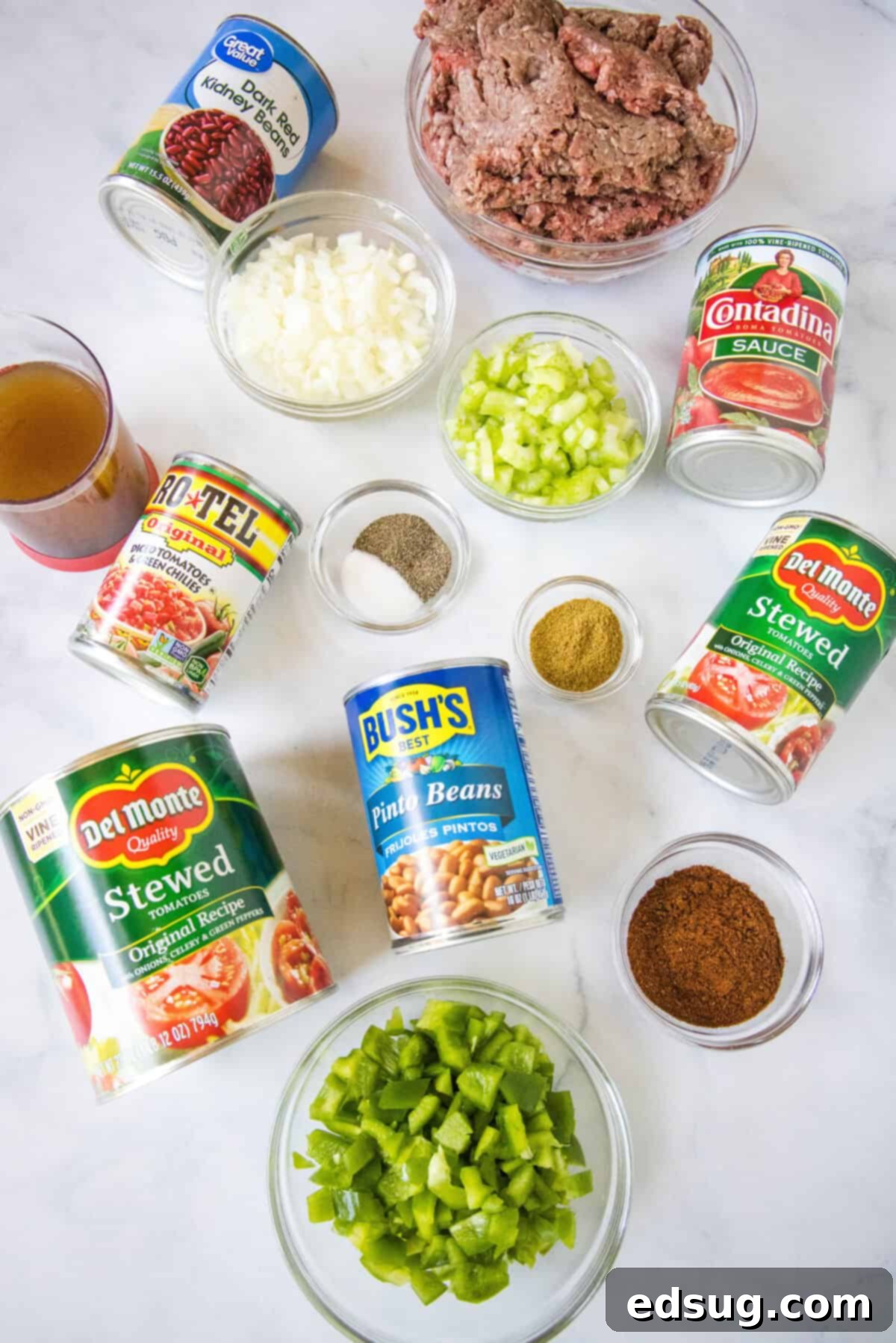 Copycat Wendy's Chili Recipe 3 A close-up shot of the rich, deep red Wendy's chili bubbling gently in a large pot, indicating its perfect simmer and thick texture, ready for serving.