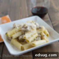 Velvety Sausage Artichoke Pasta 3 Round image of Creamy Sausage & Artichoke Pasta, perfect for a quick dinner.