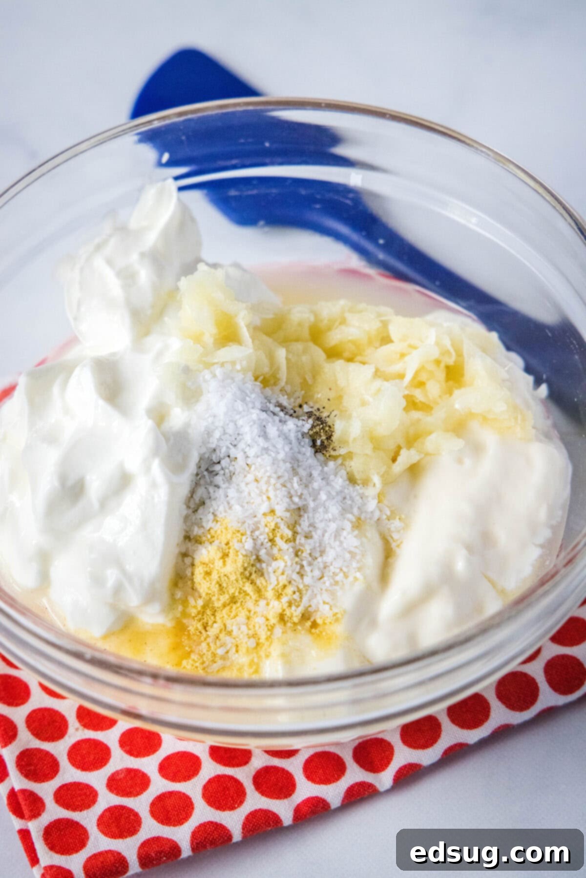 Velvety Garlic Dressing 3 garlic dressing ingredients in a mixing bowl