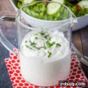 Velvety Garlic Dressing 7 cropped close up creamy garlic dressing in a jar