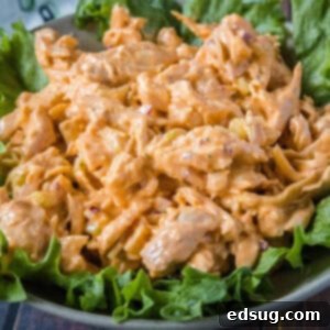 Fiery Buffalo Chicken Salad 8 close up buffalo chicken salad on bed of greens