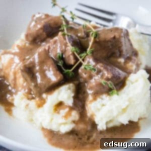 cropped close up no peek beef tips in gravy