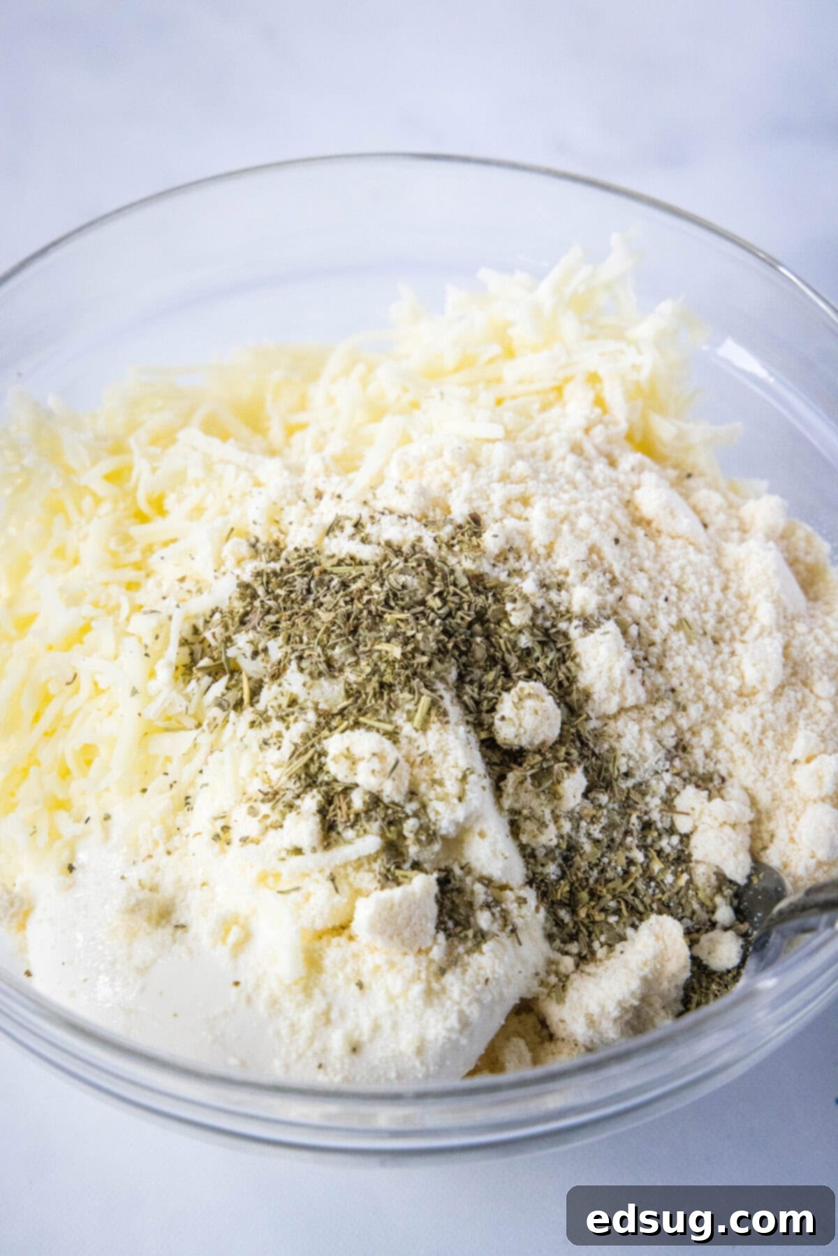 Effortless Lasagna Bowl 3 Creamy ricotta, mozzarella, and Parmesan cheese mixture for the lasagna soup topping, ready to be added