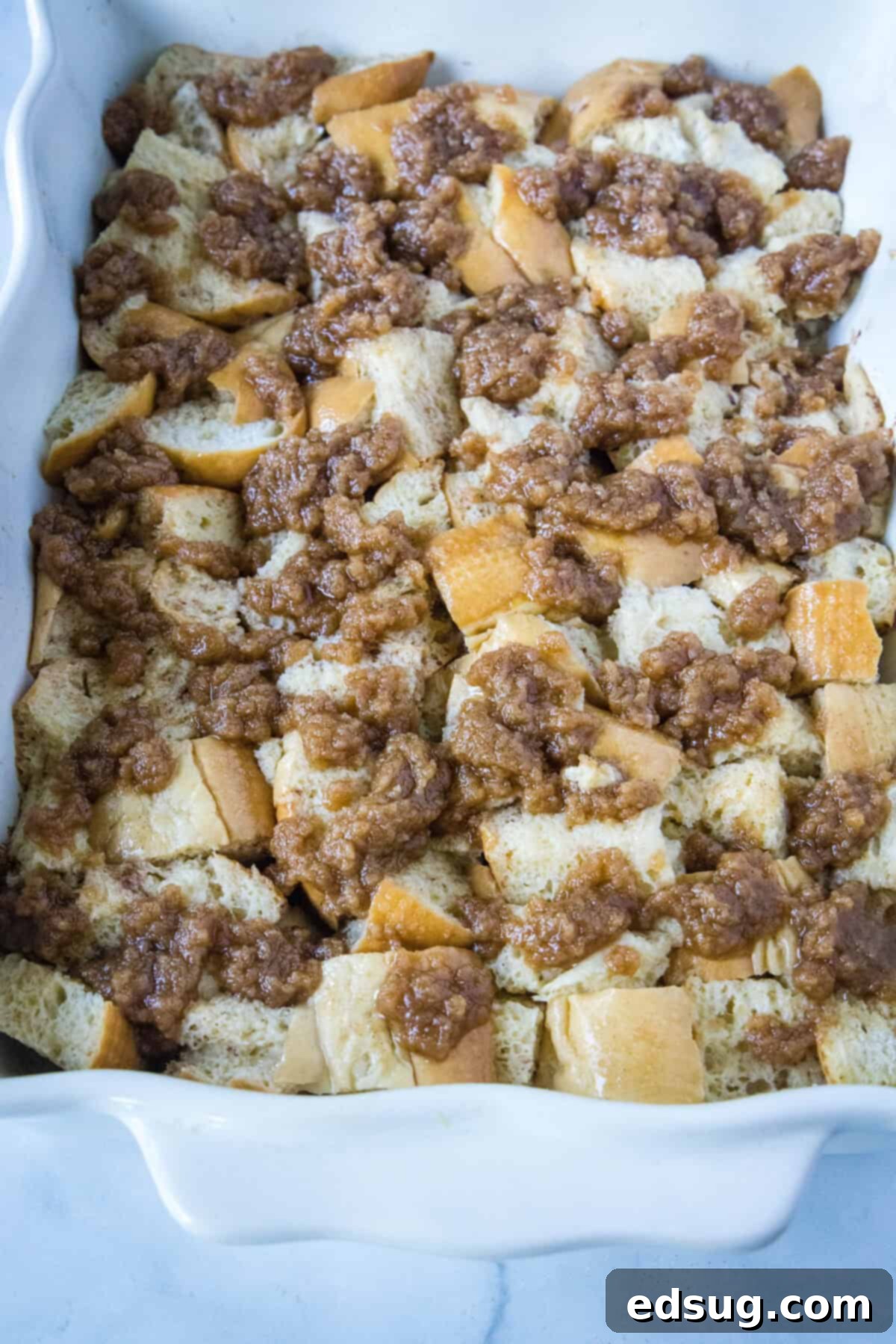 Sleep-In French Toast Casserole 5 overnight French toast casserole ready for the oven with streusel topping