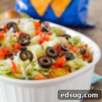 Dorito Crusted Taco Casserole 2 dorito taco casserole in a dish