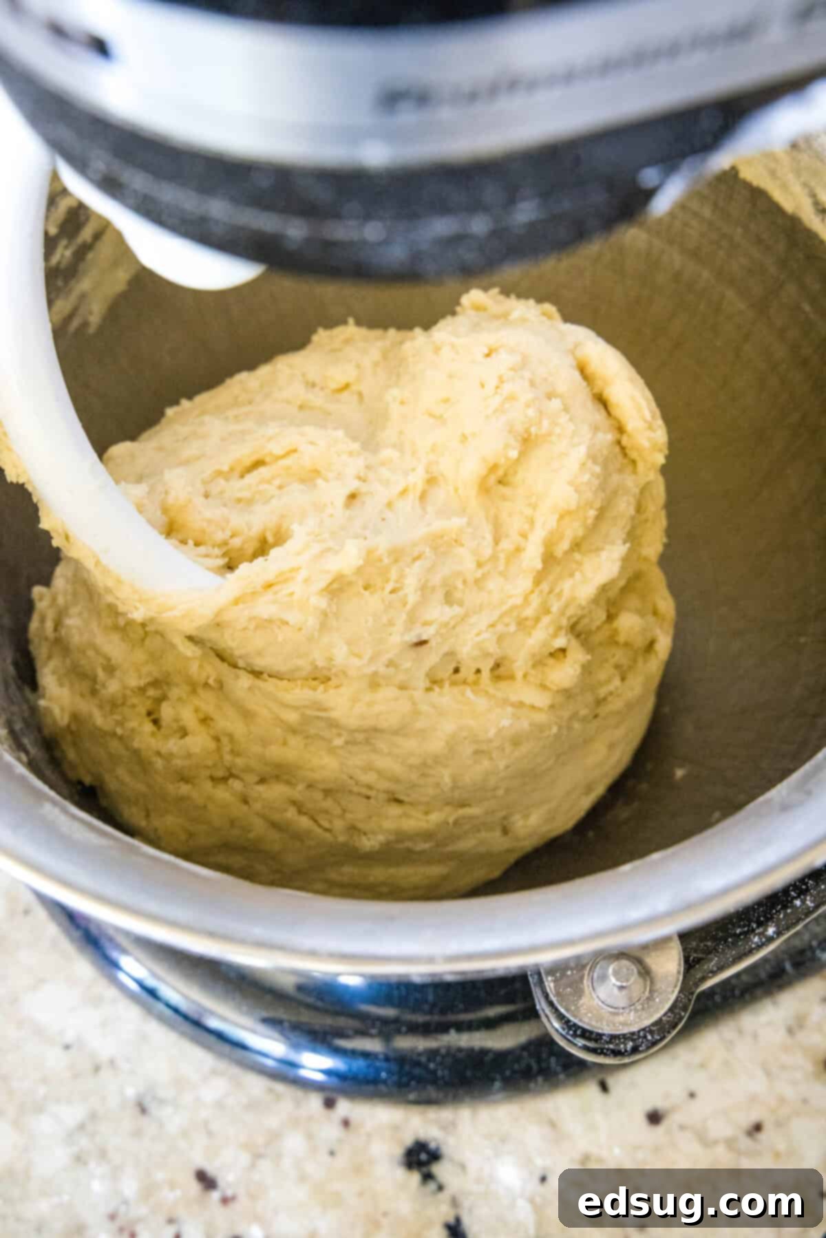 hawaiian roll dough in mixing bowl