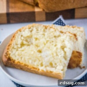 Close up slice of slow cooker bread with butter on a plate
