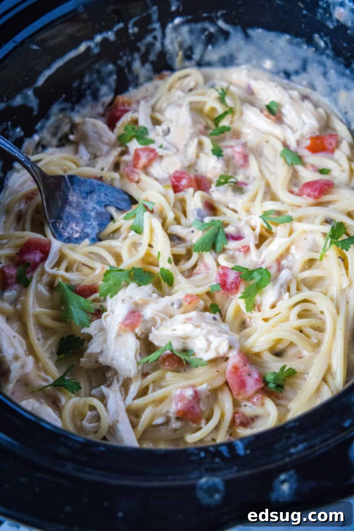 Effortless Slow Cooker Chicken Spaghetti 4 slow cooker chicken spaghetti in the crockpot