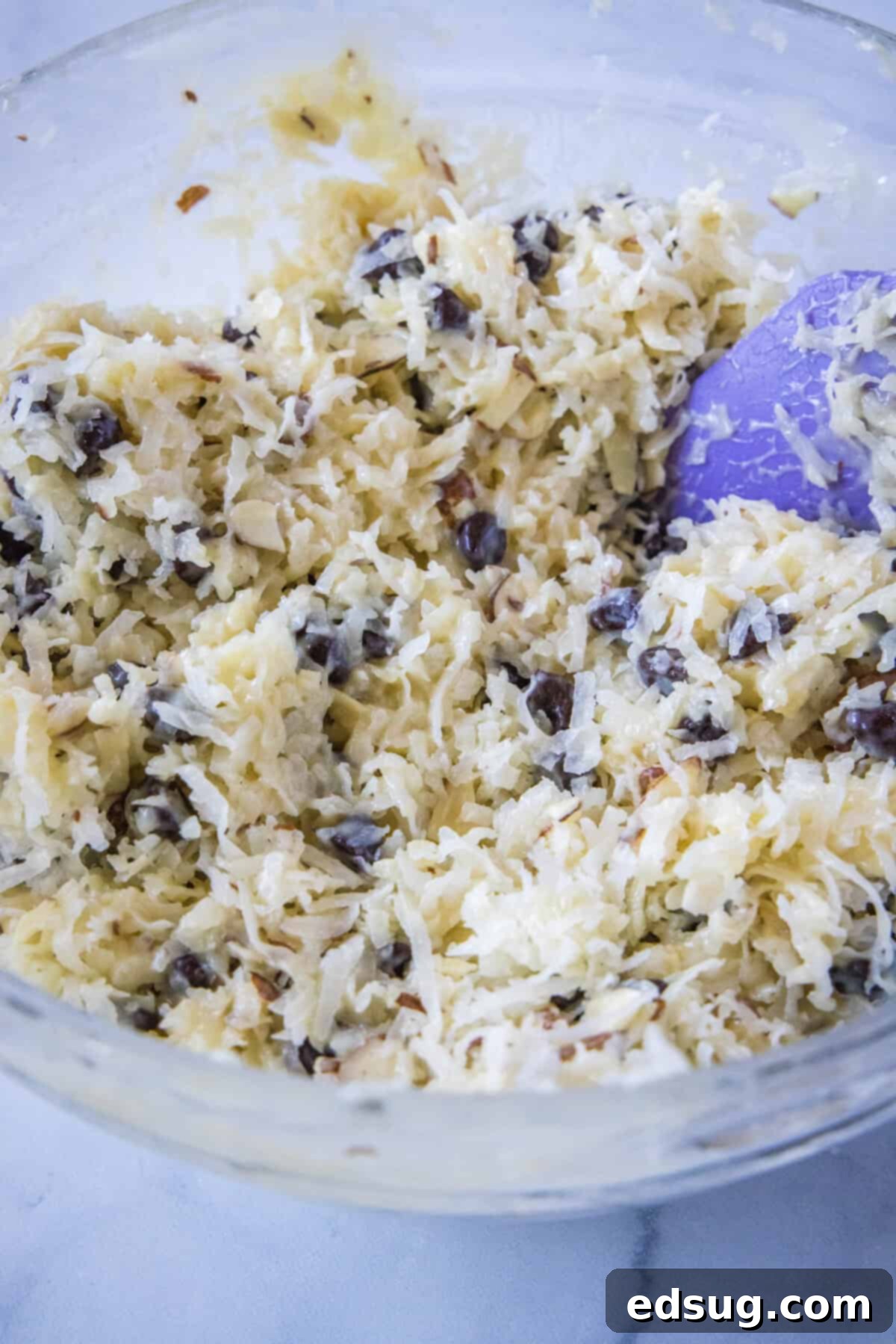 Almond Joyful Coconut Cookies 4 almond joy cookie dough in a mixing bowl