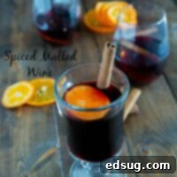 Spiced Mulled Wine - a winter favorite! Warm spices with a hint of orange!