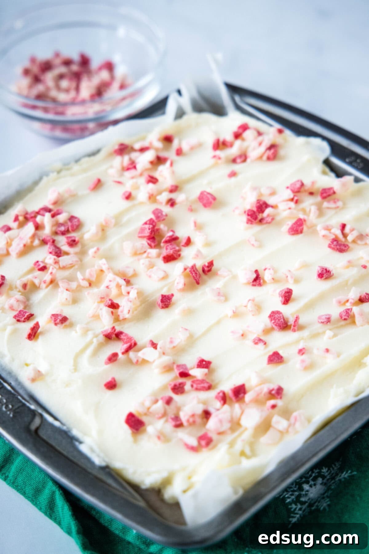 Holiday Peppermint Sugar Cookie Bars 5 frosted peppermint sugar cookie bars in baking pan