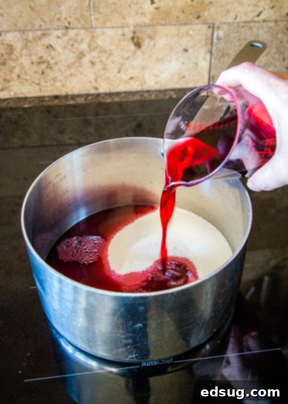 Garnet Pomegranate Sparkler 4 sugar in a saucepan adding pomegranate juice