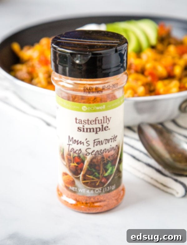 Fiesta Taco Pasta Skillet 4 Tastefully simple taco mix in front of taco pasta skillet in pan