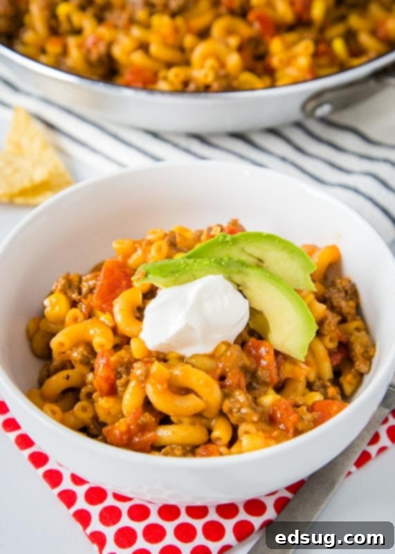 Fiesta Taco Pasta Skillet 5 bowl of taco pasta skillet with sour cream and avocado