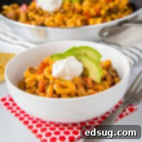 Fiesta Taco Pasta Skillet 8 Taco Pasta Skillet - All the flavors of taco night in a one pan meal, ready in 20 minutes! Homemade version of taco Hamburger Helper, with just a few staple ingredients.