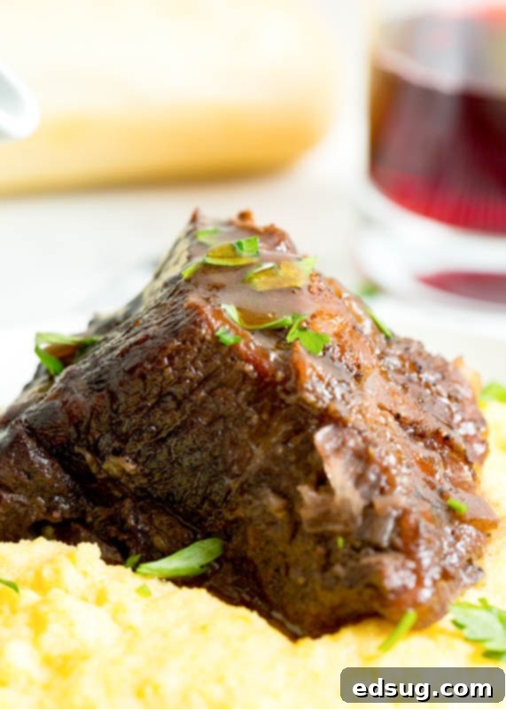 Fork-Tender Red Wine Short Ribs 6 beef short rib with sauce over polenta