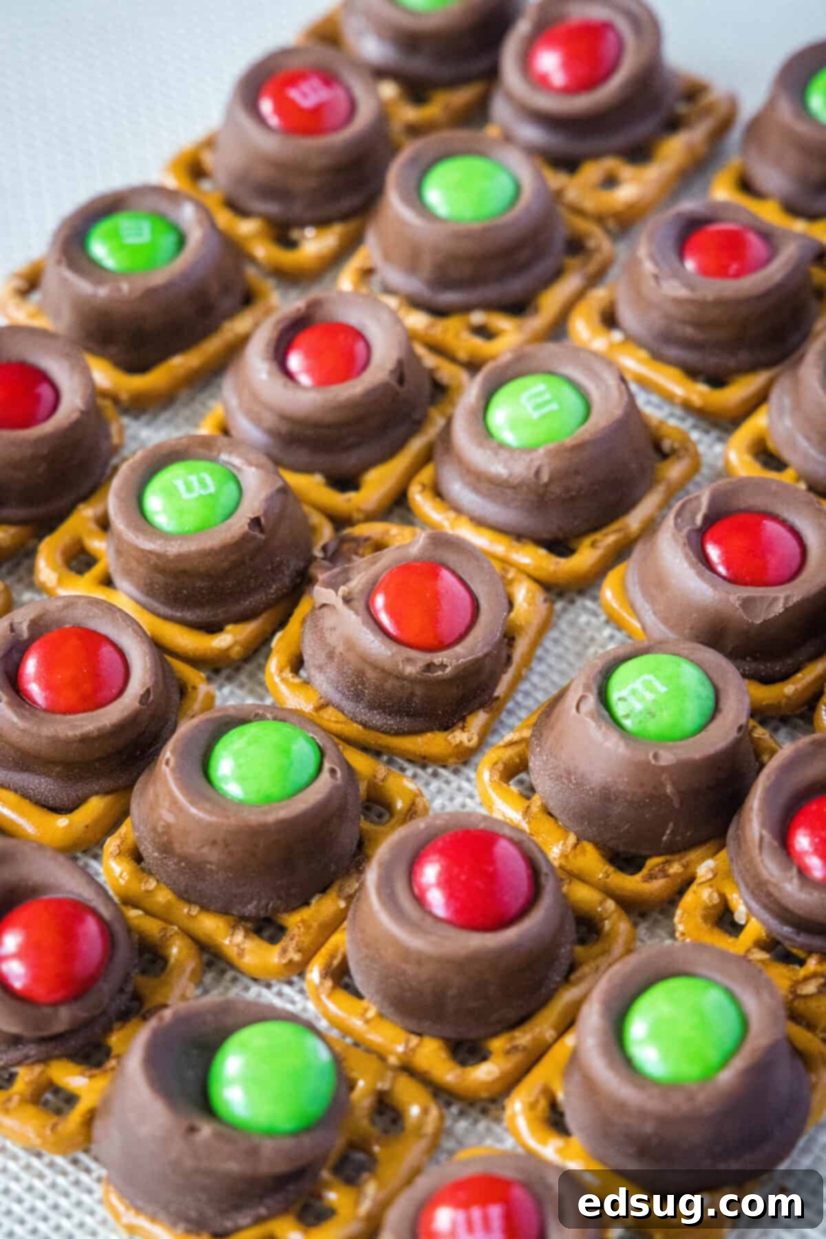 rolo pretzels setting up on baking tray
